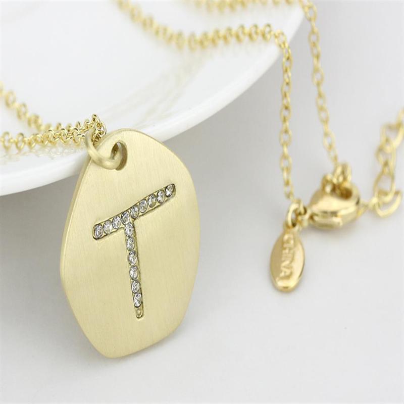 Gold & Brush Brass Chain Pendant with Top Grade Crystal in Clear
