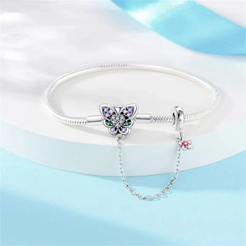 Butterfly Charm Bracelet with Crystal Accents and Flower Dangle